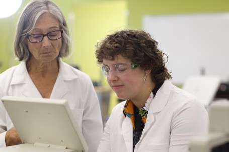 Student and Instructor Working in Biotech Lab