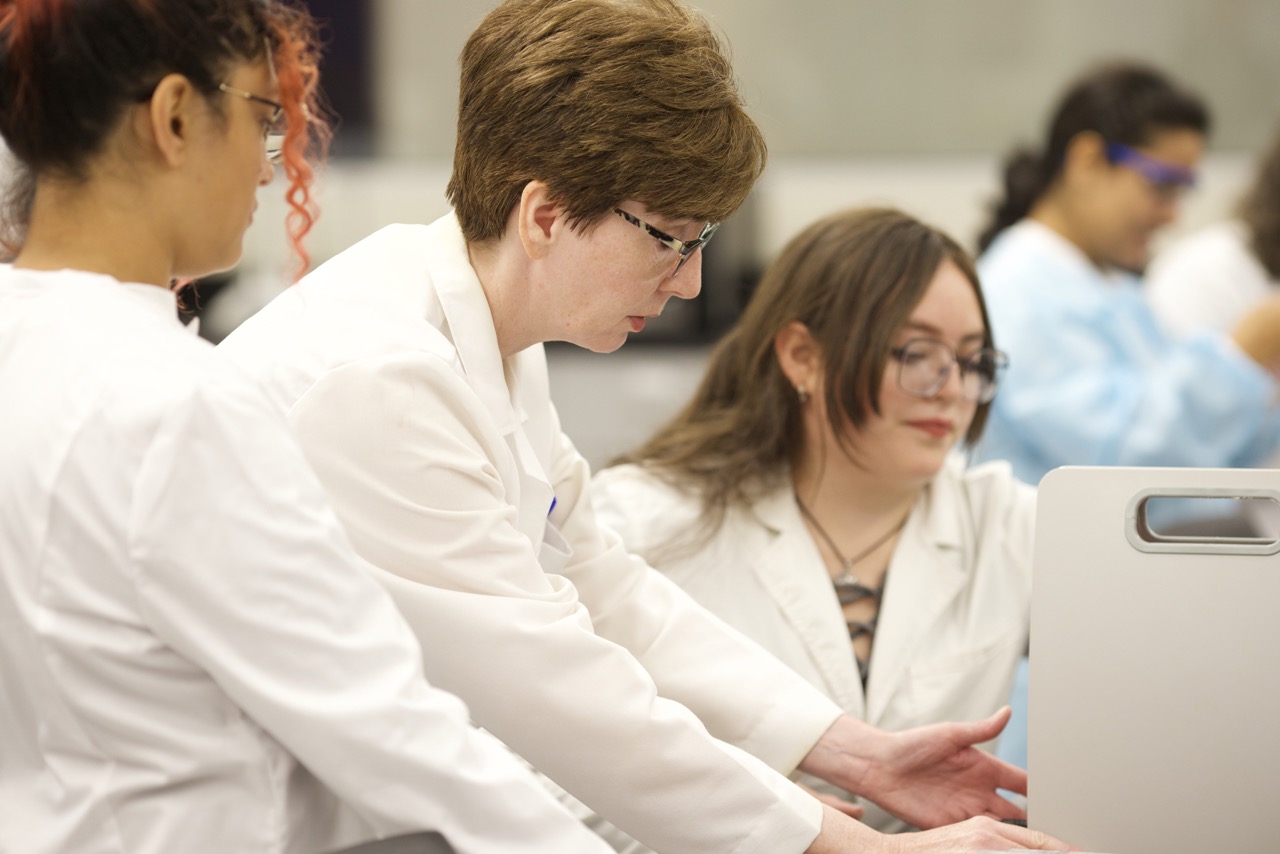 Students Working with an Instructor in the Lab