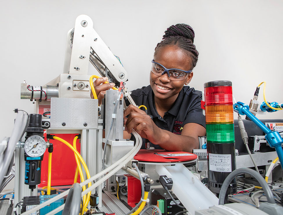 Student working on machine