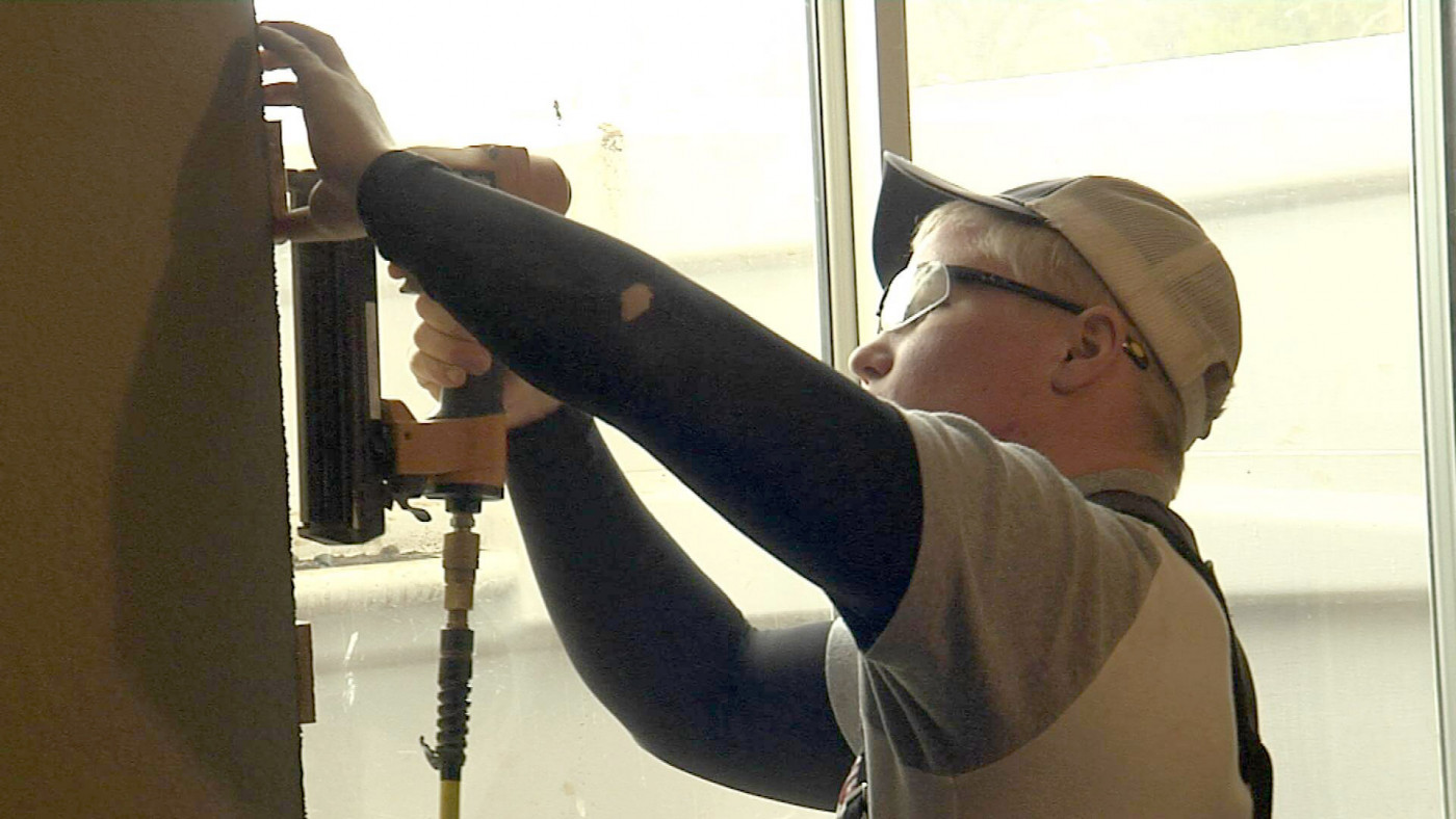 Student building and learning carpentry