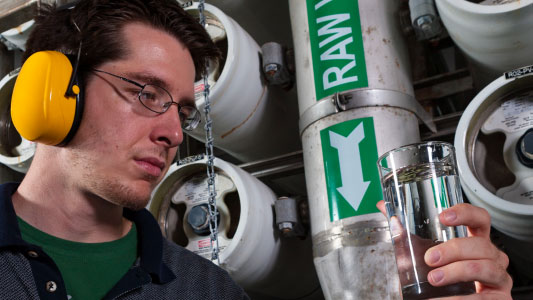 Technician reviewing water quality