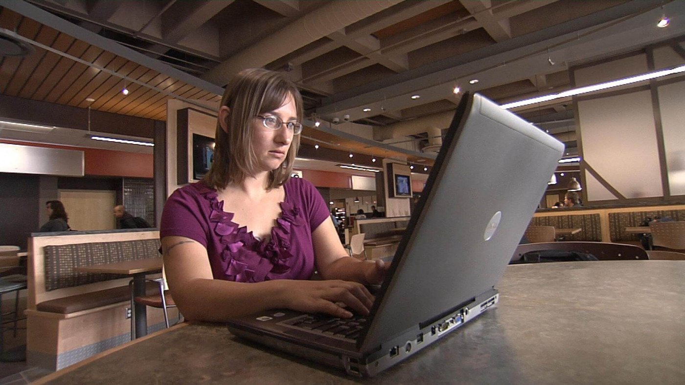 leadership development student working on a laptop