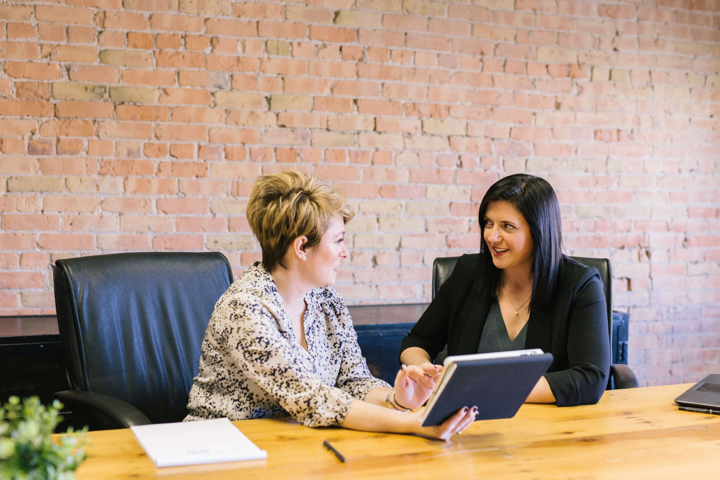 2 women discussing mortgage lending options