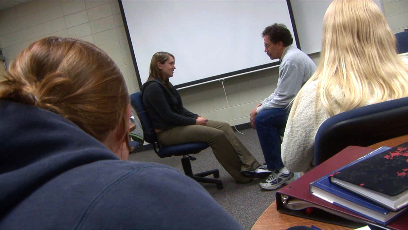 Students observing a counseling session