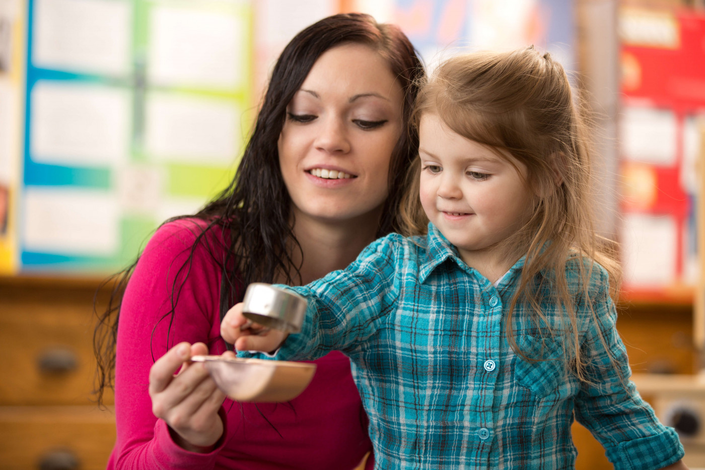 Early Childhood teacher with child