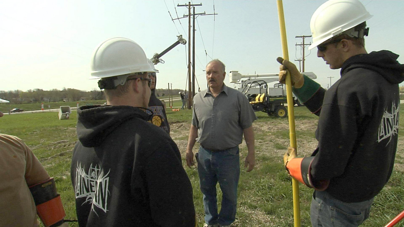 electrical construction workers and manager