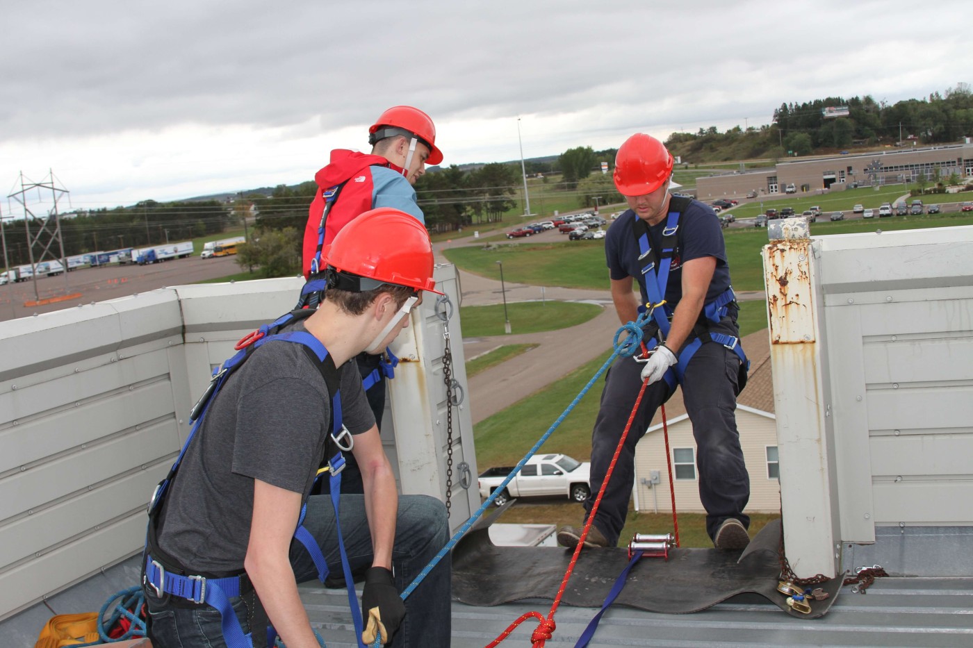 Students using harness for safety