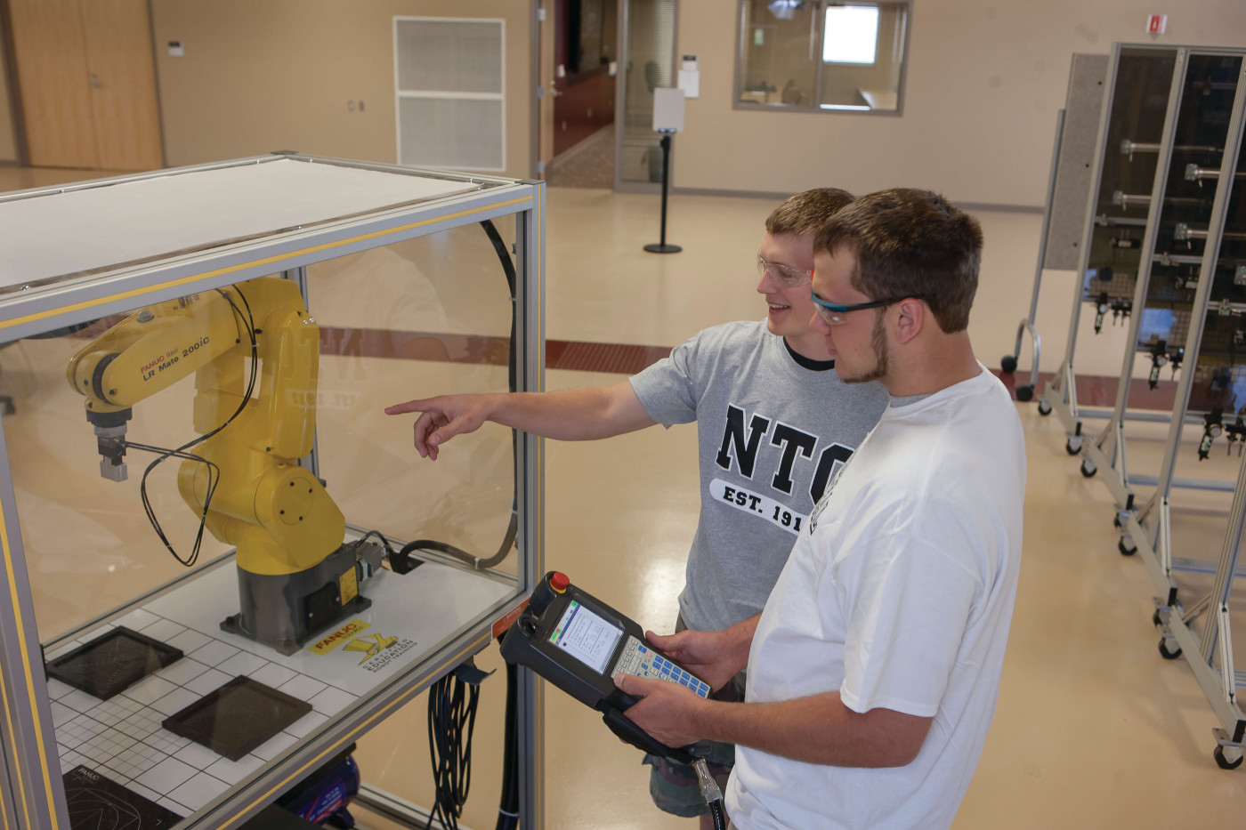 students with robotic arm