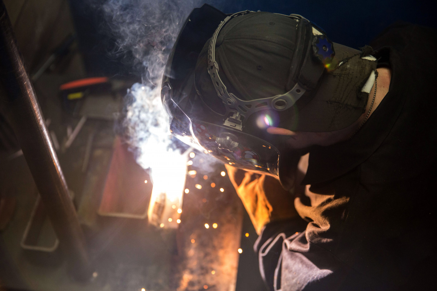 looking down on an ironworker/welder 